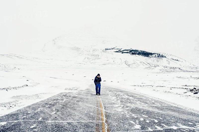 Winter road trip on the Icefields Parkway with lots of snow and ice, Banff National Park, Jasper National Park, Alberta, Canada