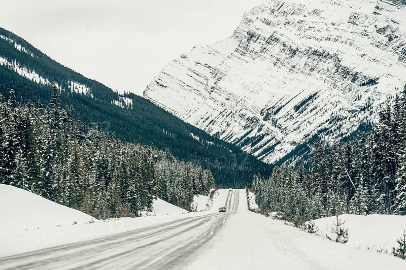 Winter road trip on the Icefields Parkway with lots of snow and ice, Banff National Park, Jasper National Park, Alberta, Canada