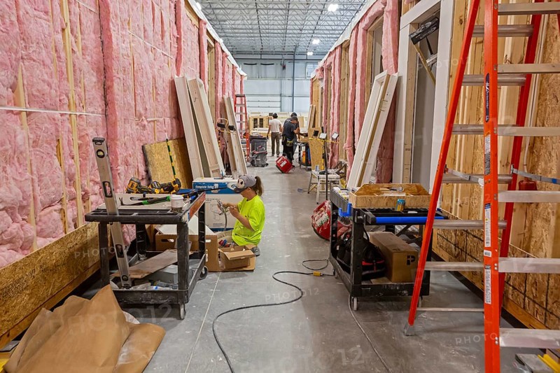 Romulus, Michigan - Workers build apartments in Ginosko Modular 's factory using modular construction methods. The units will be assembled into an apartment building in Detroit for low to moderate income households