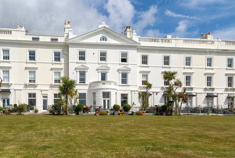 Historic terrace houses built c 1860s overlooking Plymouth Sound, Grand Parade, West Hoe, Plymouth, Devon, England, UK