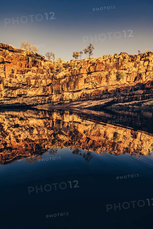 Bell Gorge waterfall, a body of water in north-west Australia in the Kimberley. Sunrise in the outback, Australia