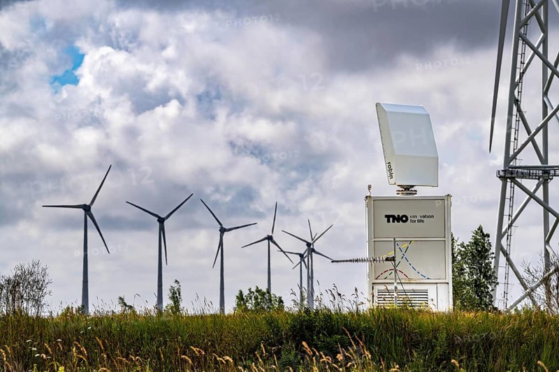 Wind farm in Eemshaven, radar system of the Dutch manufacturer Robin, bird radar, here type Robin Max Radar, detects birds and flocks of birds up to 15 km away in order to switch off wind turbines if necessary to avoid collisions and minimise damage, Netherlands