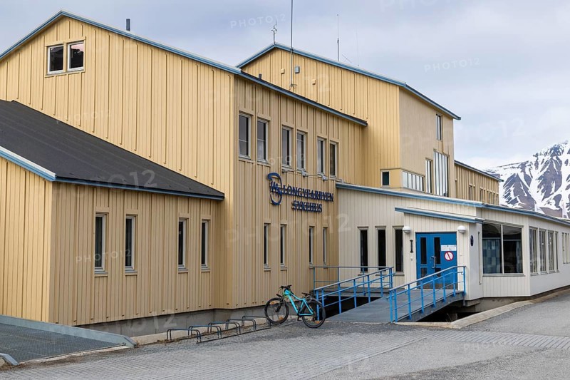 Hospital, yellow wooden house, Longyearbyen, Spitsbergen, Svalbard