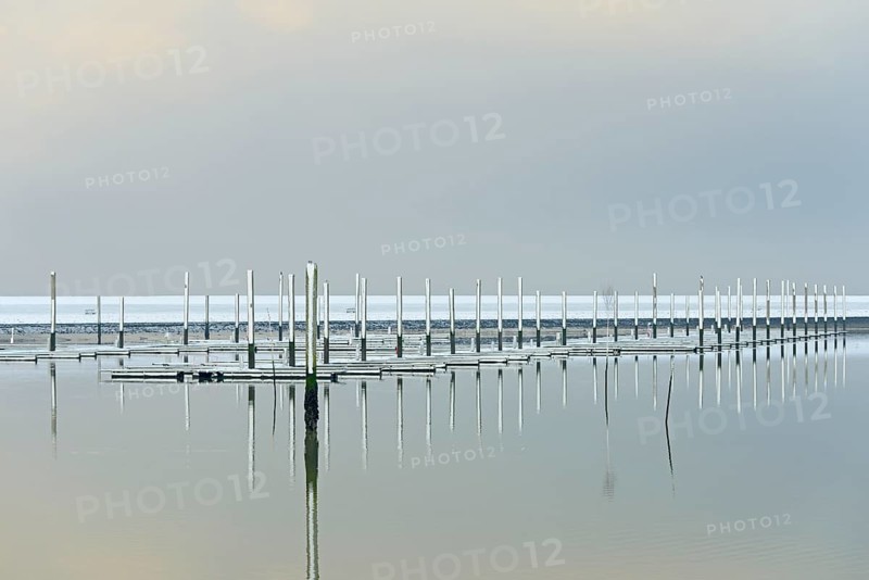 Winter day, onset of winter, snow on the jetties in the marina, North Sea, Norddeich, Lower Saxony, Germany