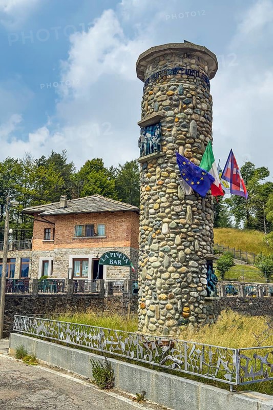 1955 on 1311 m high pass summit of Alpine pass asphalted road pass built round tower erected monument to victims from Valli di Lanzo, Susa, Sangone, Chisone of members involved in Resistenza resistance against Italian fascism and German occupation, Rubiana, Turin, Piedmont, Italy