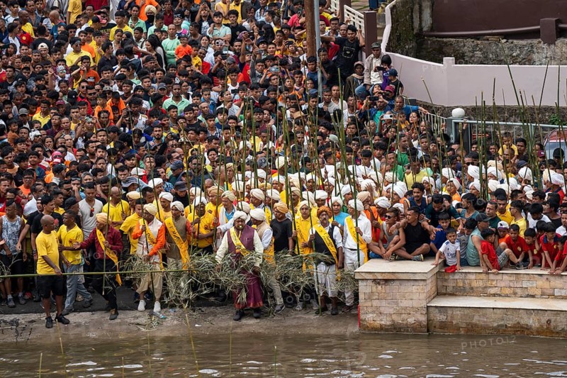 JOWAI, INDIA - JULY 14: People from the Pnar community attend the Behdienkhlam festival in Jowai, India on July 14, 2025. Behdienkhlam is a vibrant annual festival celebrated by the Pnar (Jaintia) community of Meghalaya, especially in Jowai, to drive away plague and diseases and to pray for a good harvest. Observed in July after the sowing season, it features traditional rituals, offerings to ancestral spirits, and the grand procession of beautifully decorated bamboo structures called rots, which are later immersed in a sacred muddy pool known as Ka Aitnar