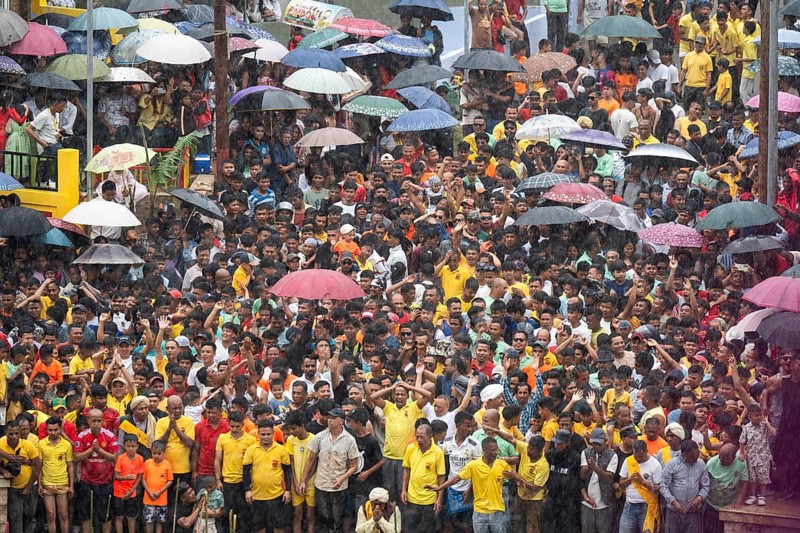 People from the Pnar community attend the Behdienkhlam festival in Jowai, India on July 14, 2025. Behdienkhlam is a vibrant annual festival celebrated by the Pnar (Jaintia) community of Meghalaya, especially in Jowai, to drive away plague and diseases and to pray for a good harvest. Observed in July after the sowing season, it features traditional rituals, offerings to ancestral spirits, and the grand procession of beautifully decorated bamboo structures called rots, which are later immersed in a sacred muddy pool known as Ka Aitnar