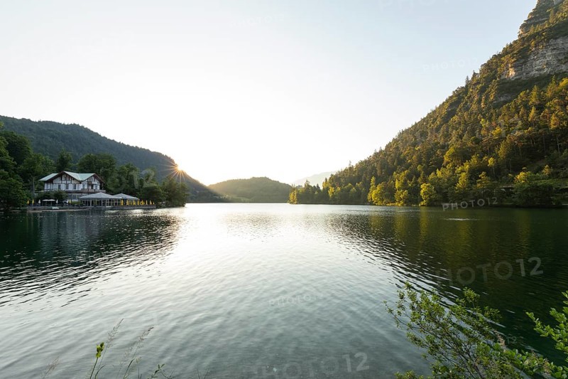 Sunrise in summer at Lake Thumsee near Bad Reichenhall with a view of the Seewirt