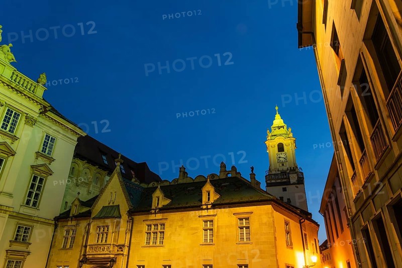 Night shot of Primitial Square with New and Old Town Hall and Primitial Palace in the historic centre of Bratislava, Slovakia