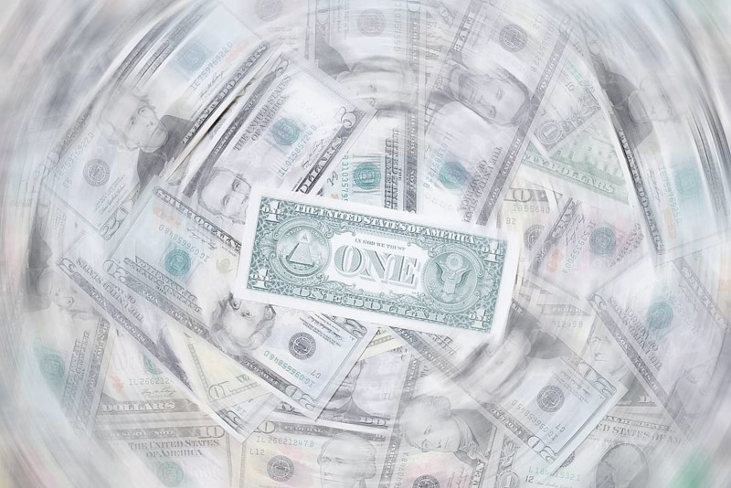 Various US dollar notes in a pile, banknotes