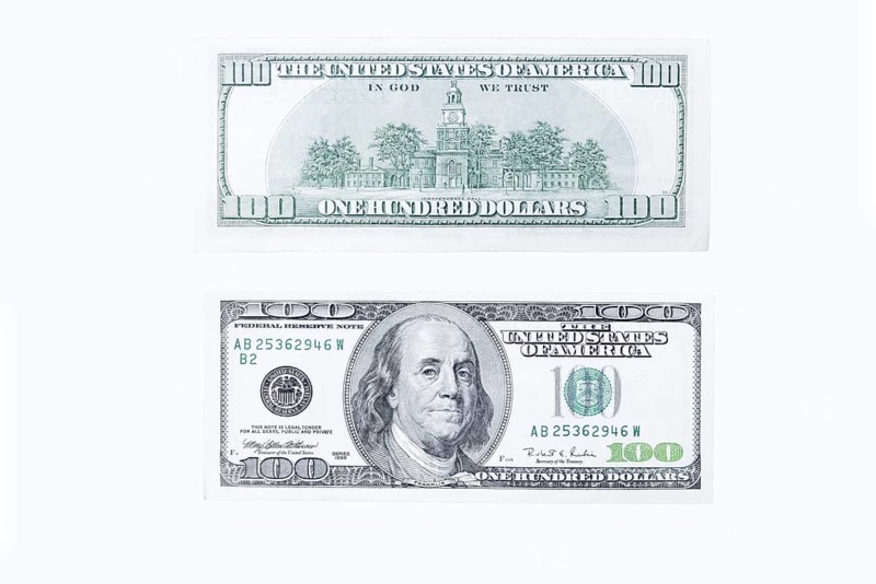 100 US dollar note, 100 dollar banknotes on white background