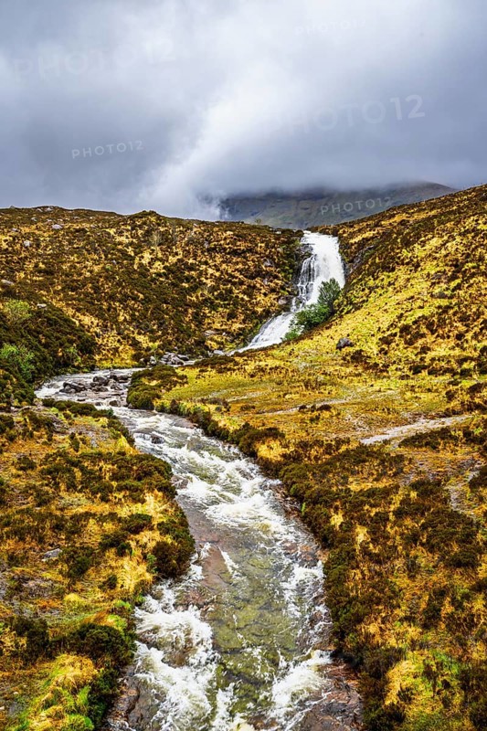 Eas a' Bhradain waterfall, Red Cuillin mountains, Loch Ainort, Isle of Skye, Scotland, UK