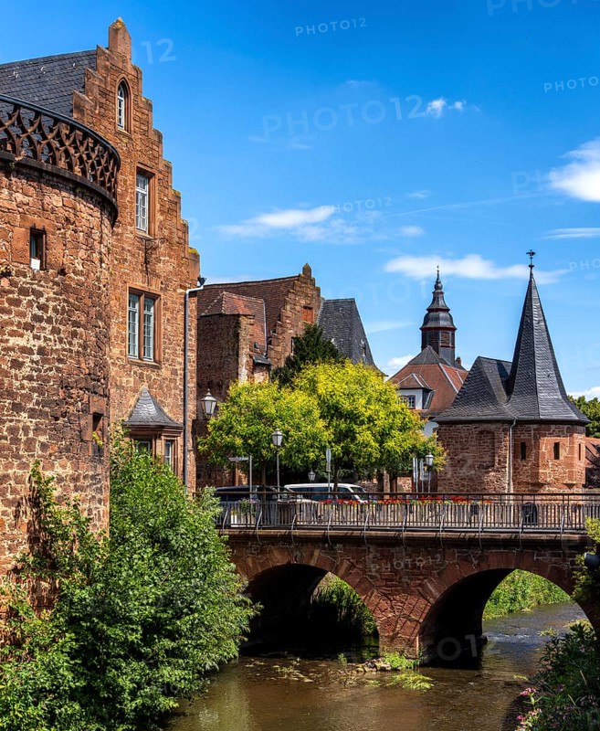 The old town centre with the town wall and the Seemenbach stream, Büdingen, Hesse, Germany