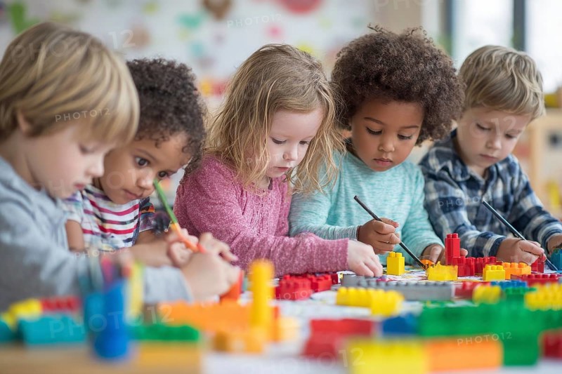 Children developing creativity while playing painting and drawing games at the table at daycare facility, AI generated