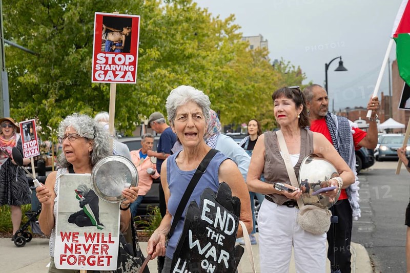 Detroit, Michigan USA - 26 July 2025 - Protesters rally at Eastern Market, banging empty pots to protest starvation in Gaza