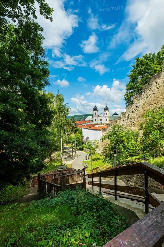 Small park with seating, a playground and a fountain at the entrance to Trencin Castle, Capital of Culture 2026, Trencín, Slovakia