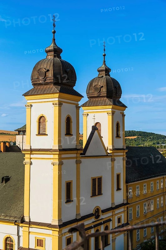 View from the city tower of the Piarist Church of St Francis Xavier and the old town in the evening light, Capital of Culture 2026, Trencín, Slovakia