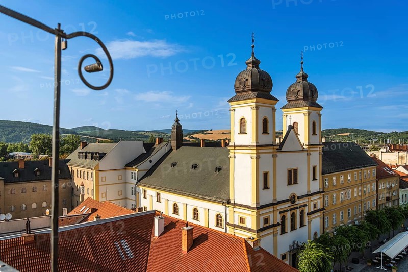 View from the city tower of the Piarist Church of St Francis Xavier and the old town in the evening light, Capital of Culture 2026, Trencín, Slovakia