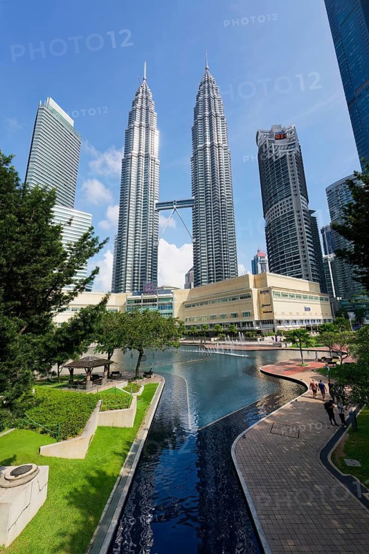 Petronas twin towers and Symphony Lake in KLCC park, Kuala Lumpur, Malaysia, Asia