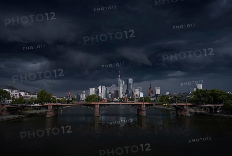 A storm passes over the Frankfurt banking skyline with gloomy clouds, Frankfurt am Main, Hesse, Germany