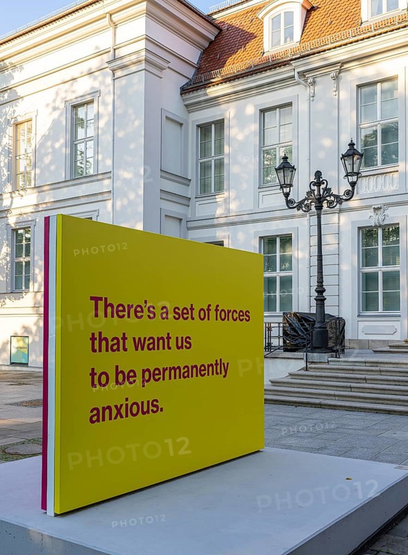 Tony Cokes, visual artist and educator, display panel at the Palais Populaire Unter den Linden, Berlin, Germany