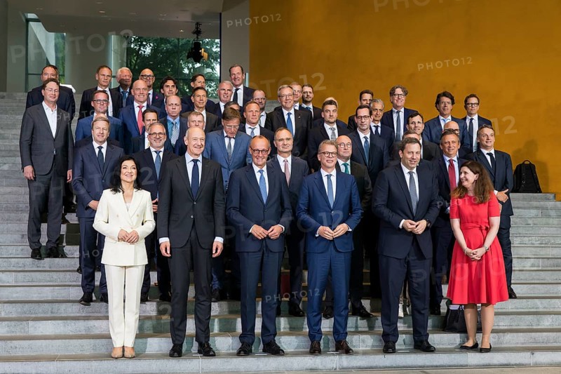 Group photo of the Made for Germany Investment Summit, including in the first row Katherina Reiche (CDU, Federal Minister for Economic Affairs and Energy), Roland bush (CEO of Siemens), Friedrich Merz (CDU, Federal Chancellor), Christian Sewing (CEO of Deutsche Bank), Lars Klingbeil (SPD, Federal Minister of Finance, Vice Chancellor and SPD Federal Chairman) and Bettina Orlopp (CEO of Commerzbank) . The Made for Germany investment summit aims to strengthen Germany as a business location. To this end, representatives from a total of 61 German companies meet with Chancellor Merz in the Federal Chancellery, Berlin, 21 July 2025