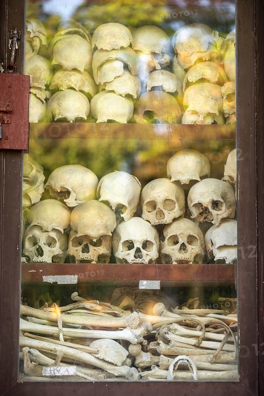 Shrine with human skull, memorial to the victims of the Khmer Rouge regime, Wat Thmei, Siem Reap, Cambodia
