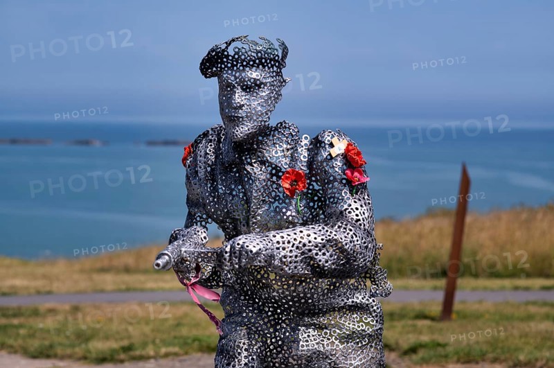 Sculpture by Bill Pendell MM, British World War II veteran, looking back at himself and his comrades in the Battle of Gold Beach, D-Day 75 garden, also Le Jardin du Souvenir, D-Day, Operation Overlord, Mulberry B, Mulberry Harbour, Gold Beach, beach, Port Winston, Arromanches-les-Bains, Normandy, Calvados, France