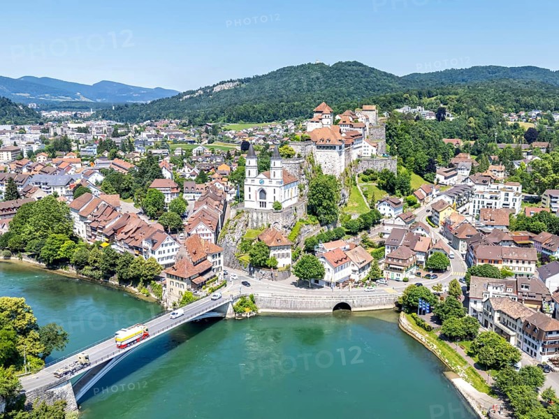 Aarburg town on the river Aare with church and fortress Aerial view from above in Aarburg, Switzerland