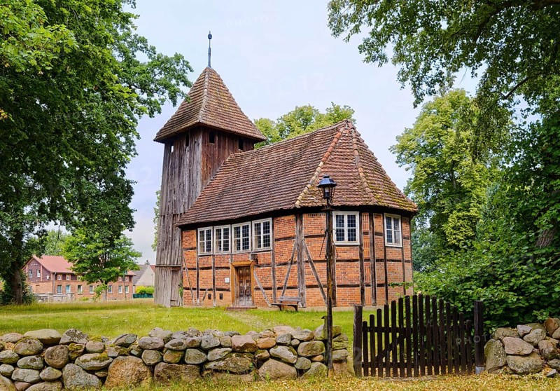 The village church of Karrenzin is a half-timbered church dating from 1721. The boarded tower on the west gable carries the bells. Karrenzin, Ludwigslust-Parchim, Mecklenburg-Voprpommern, Germany