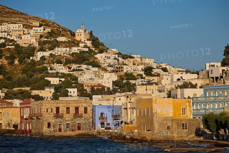 Coastal town with colourful houses along the water, church on the hill above the town, Agia Marina, Leros, Dodecanese, Greek Islands, Greece