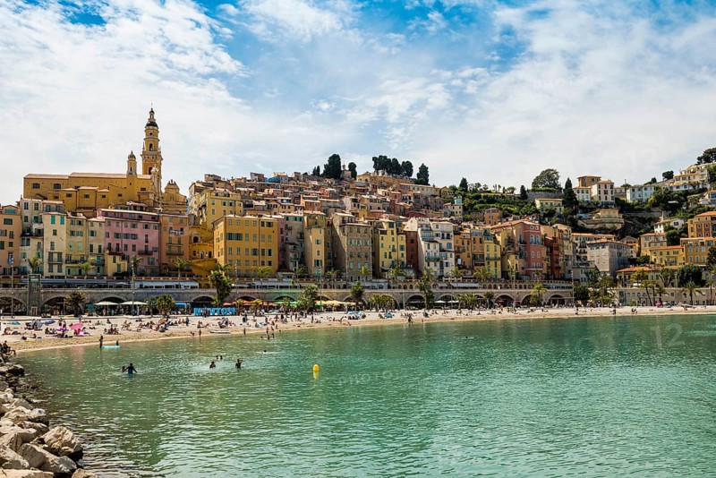 Town with colourful houses by the sea, Plage des Sablettes, Menton, Alpes Maritimes, Provence Alpes Cote d'Azur, French Riviera, South of France, France