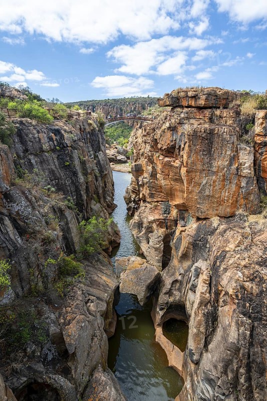 Bridges over a canyon with steep orange-coloured cliffs and the Blyde River, Bourke's Luck Potholes, Panorama Route, Mpumalanga, South Africa