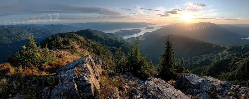 Beautiful Panoramic View of Canadian Nature Landscape from the top of the Mountain during a sunny summer sunset, AI generated