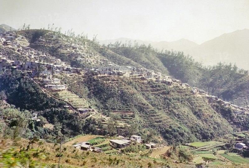 Squatter settlement huts on hillside, Pak Uk Tsai Road, New Territories, Kong Hong, Asia 1965