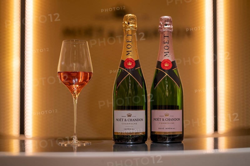 Bottle of Champagne Rosé and Impérial Brut, filled glass, logo, lettering, headquarters of the champagne brand Moët & Chandon, part of the luxury goods group LVMH Louis Vuitton Moët Hennessy, Avenue de Champagne, Épernay, Marne, France