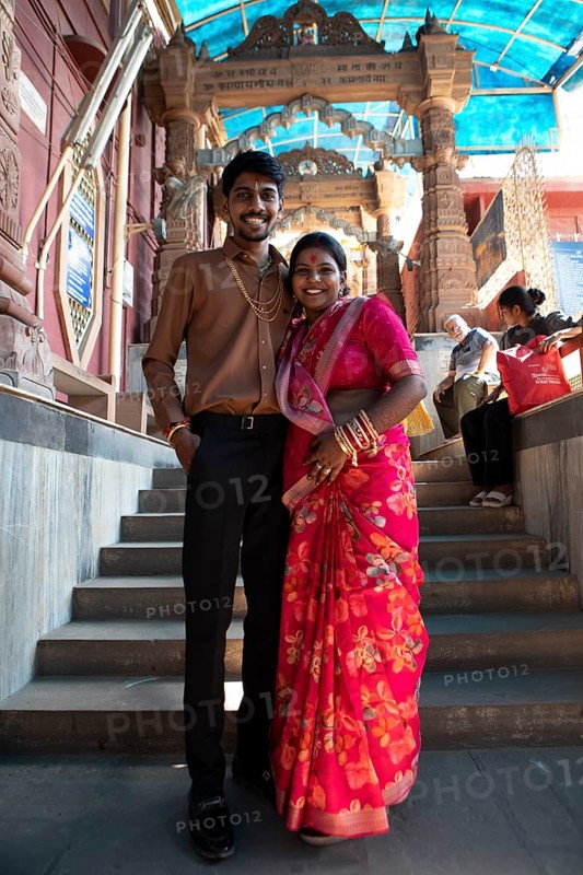 Indian wedding couple, 23 and 25 years old, at Sacchiya Mata Temple, Osian Temple Complex, Jodhpur, Rajasthan, India