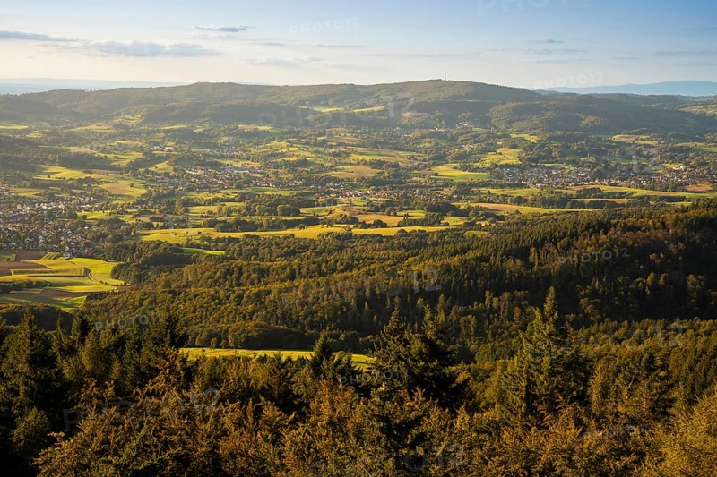 View of the Odenwald from the drum tower in Rimbach. Towns, forest, meadows, fields. Sunset. Rimbach, Bergstrasse district, Odenwald, Hesse, Germany