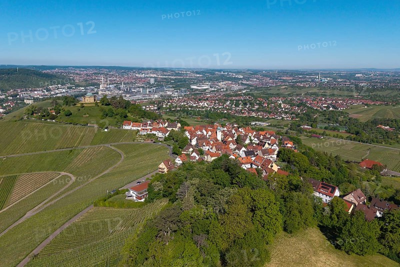 View of a city with surrounding nature and vineyards under a blue sky, view of Rotenberg near Stuttgart with a burial chapel, in the background the Mercedes-Benz plant in Stuttgart-Untertürkheim and the MHP Arena, Baden-Württemberg, Germany