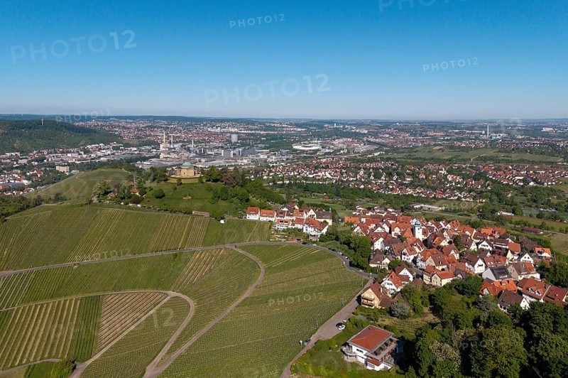 City with surrounding vineyards and landscape under a clear sky, view of Rotenberg near Stuttgart with burial chapel, in the background the Mercedes-Benz plant in Stuttgart-Untertürkheim and the MHP Arena, Baden-Württemberg, Germany