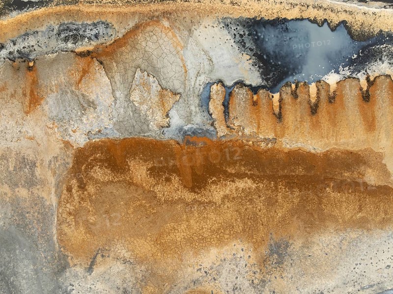 Abstract saline patterns at the edge of the Walvis Bay salt works. Aerial view. Drone shot. Namibia