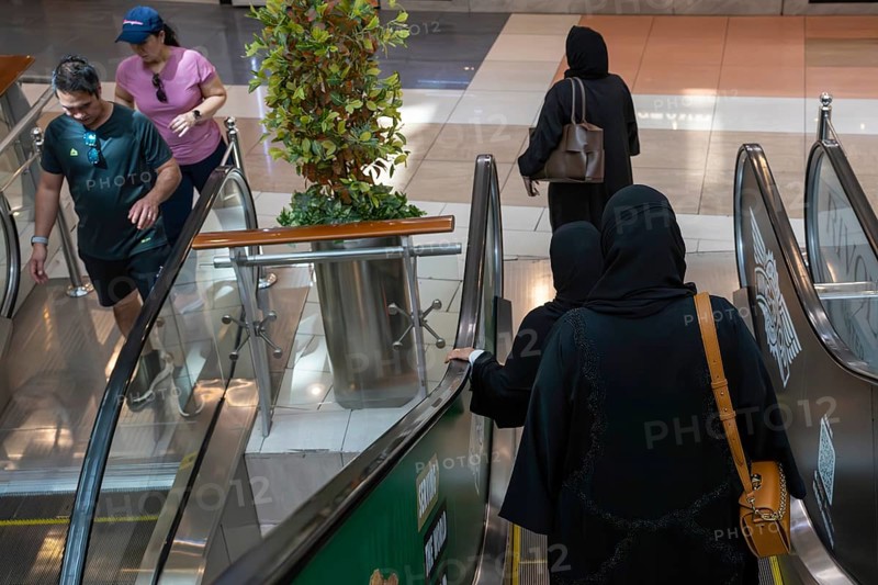 Shrouded woman with handbag, Abu Dhabi, United Arab Emirates