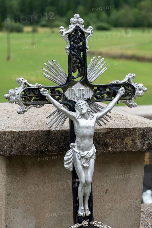 Metal cross with detailed Jesus figure in decorative design, Zgornje Jezersko, Gorenjska, Slovenia
