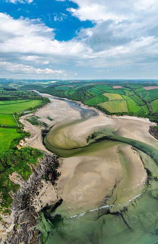 Panorama of Farms and fields over River Emme from a drone, Mothecombe, South Devon, England, United Kingdom
