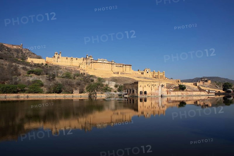 Amber Fort or fortress at Maota Lake on the Aravalli hill range, reflection in the water, Jaipur, Rajasthan, India