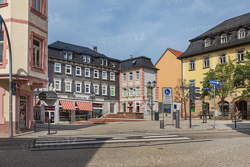 Market street with pharmacy fountain in Ilmenau, Thuringia, Germany