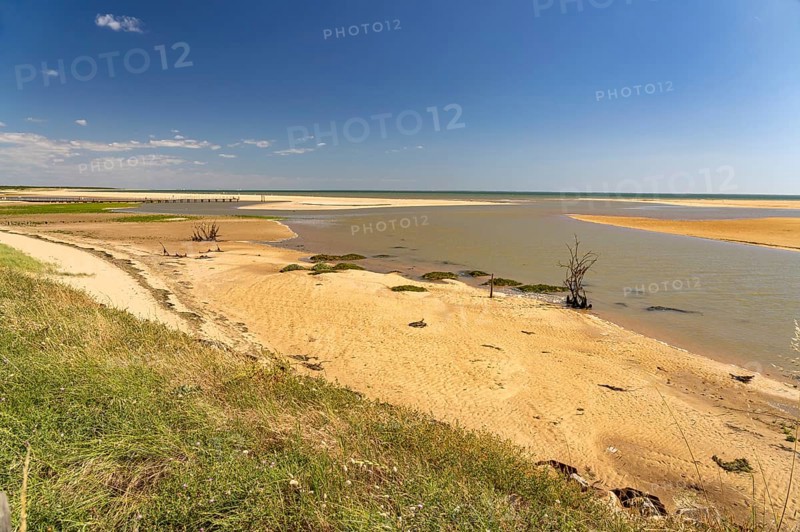 Beach and lagoon at the Belle Henriette L'Aiguillon-la-Presqu'ile National Nature Reserve, France