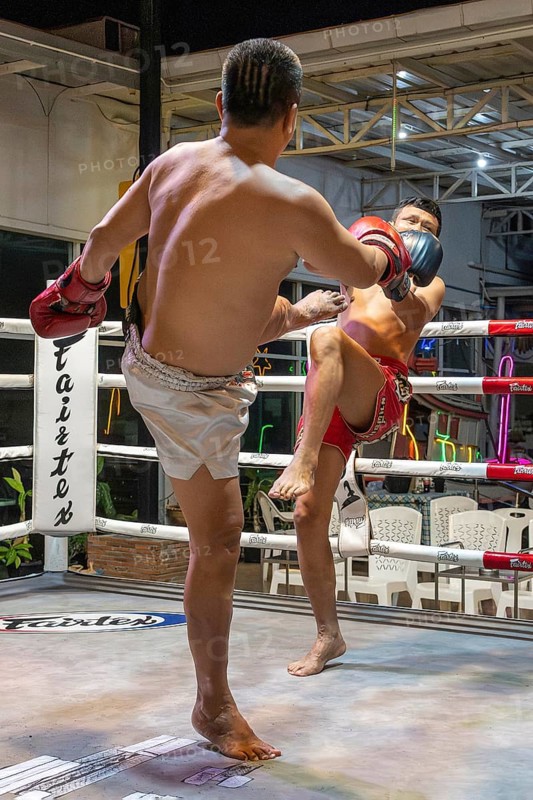 Thai boxing Muai Thai boxer in action, Pattaya, Thailand