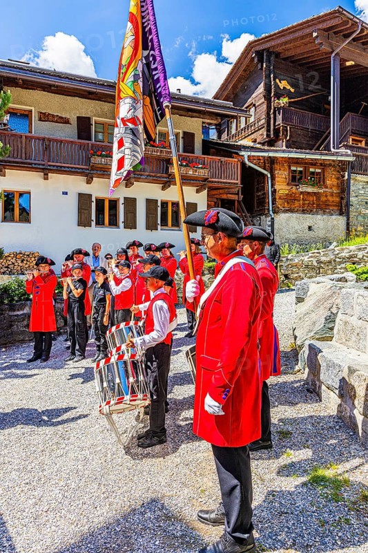 Pipers and drummers play in the historic village centre, Grimentz, Val d'Anniviers, Valais Alps, Canton Valais, Switzerland