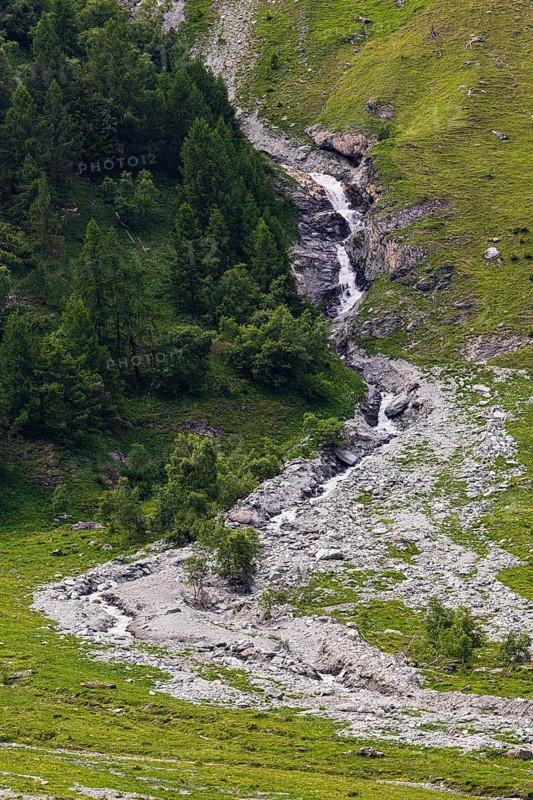 Waterfall cascading down the valley, Zinal Valley, Val d'Anniviers, Valais Alps, Canton Valais, Switzerland